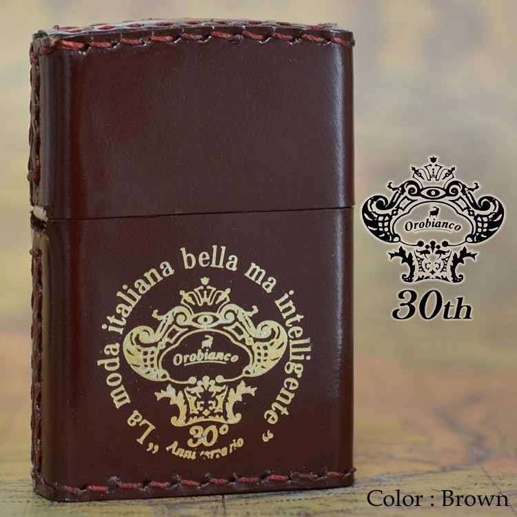 この(<font color=orange><B>30個限定生産</B></font>Orobianco オロビアンコ 30周年記念ZIPPO 本牛革巻き  Brown（茶）)の商品詳細ページを見る